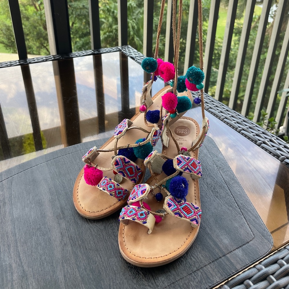 Beautiful Sandals with a lot of decor. Ideal for holidays